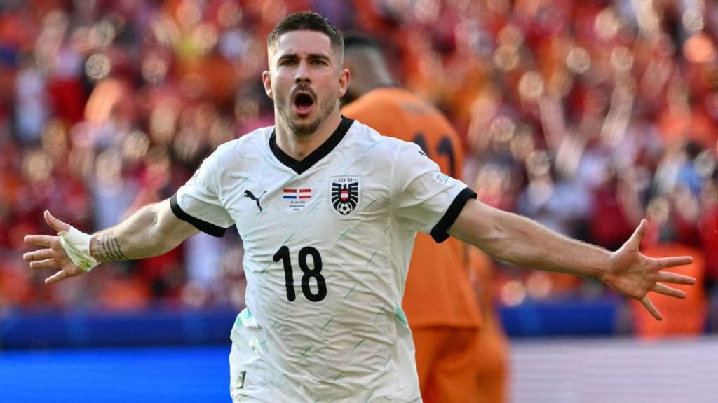 Romano Schmid celebrates scoring against the Netherlands for Austria