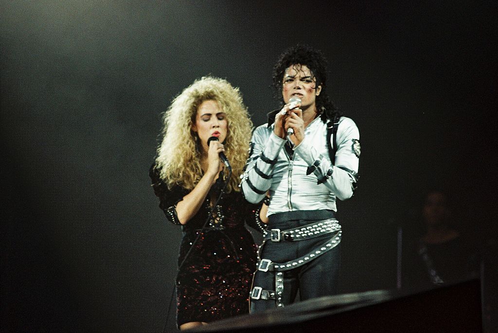 Sheryl Crow performs with Michael Jackson at Wembley Stadium in 1988