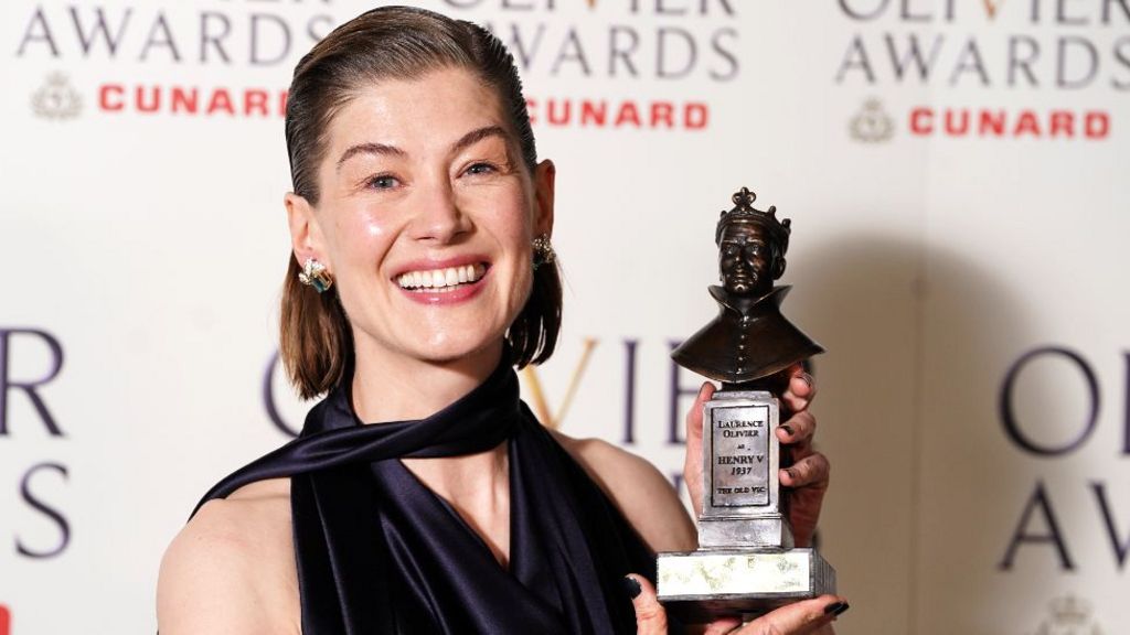 Rosamund Pike with her Best Actress award for Inter Alia at The Olivier Awards at the Royal Albert Hall, London