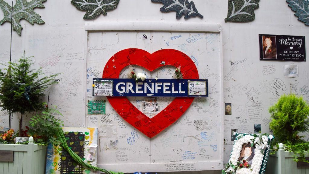 Tributes are seen on the Grenfell Tower memorial wall as the inquiry report is published.