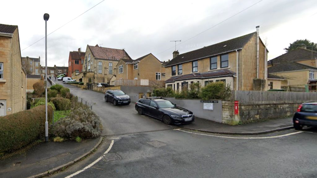 A residential area in Bath near Dransfield Way with a few cars parked on pavements