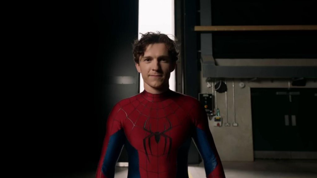 Tom Holland as Spider-Man standing in an empty film studio