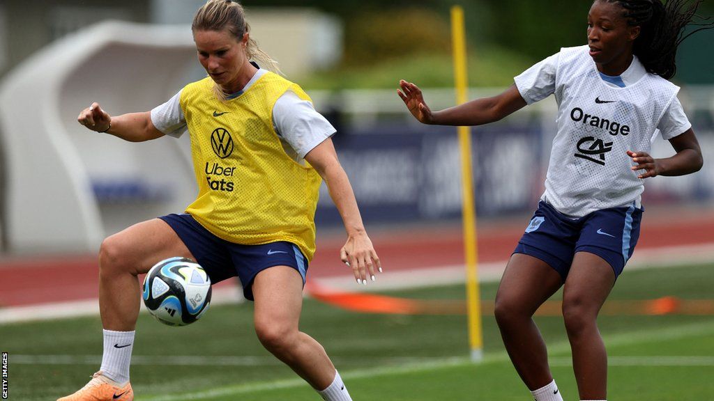 Amandine Henry (left) in action during training with France