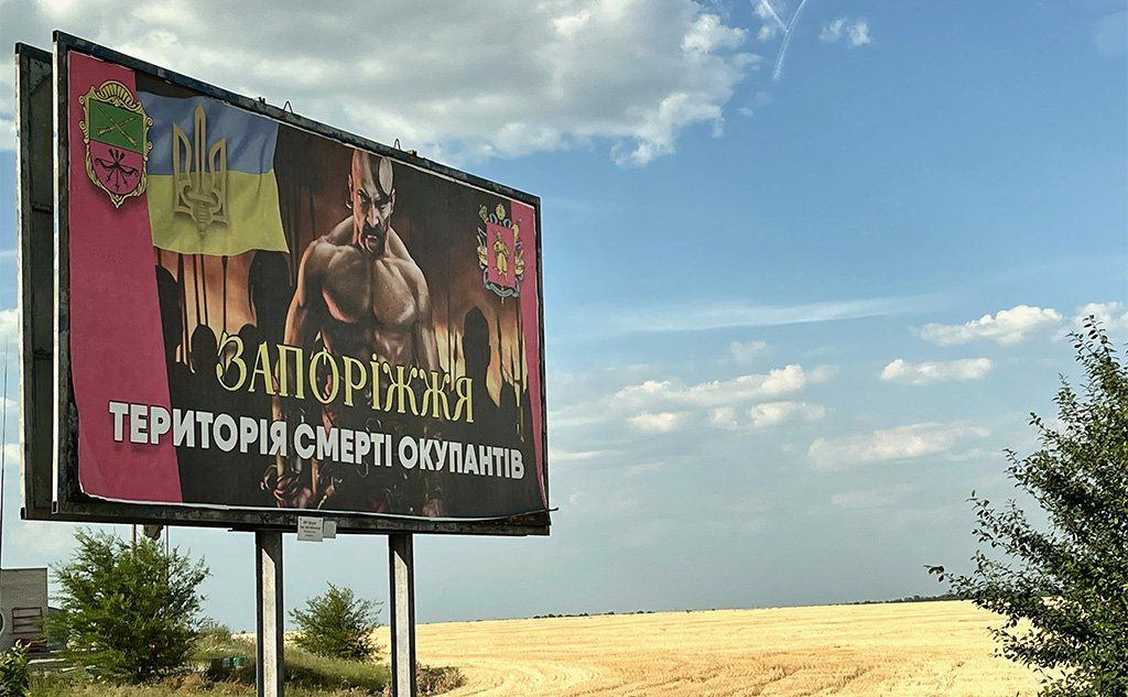 Poster reads: Zaporizhzhia land of death to the occupiers