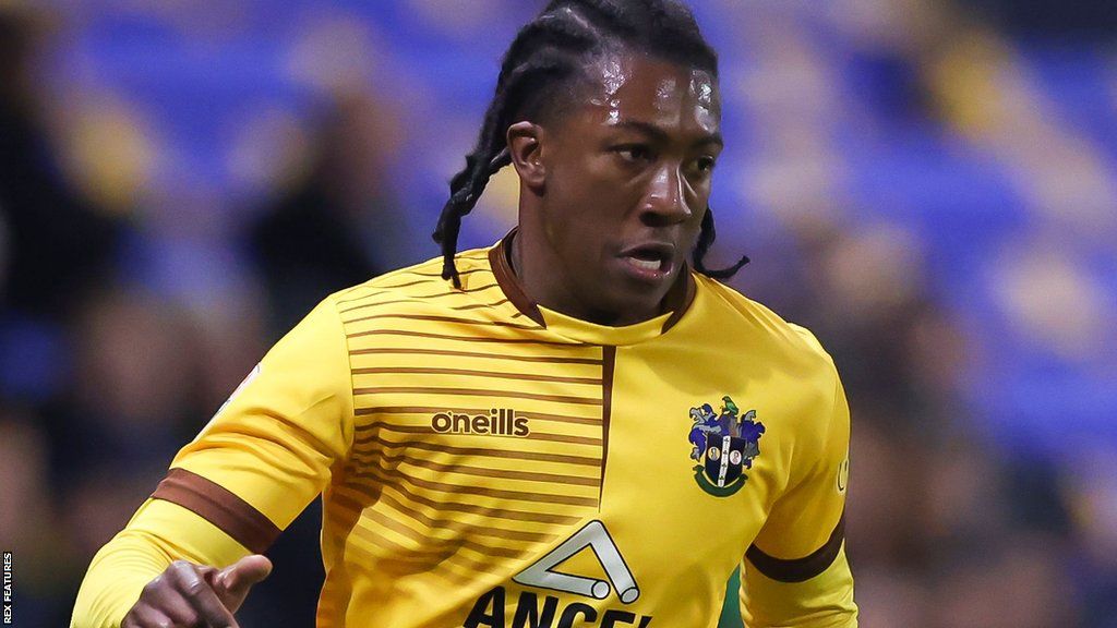 Josh Neufville in action for Sutton United