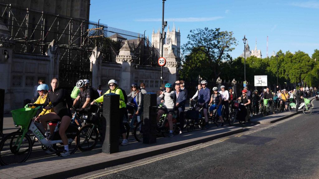 Cyclists on Bridge Street, Westminster at 8am the Embankment.
