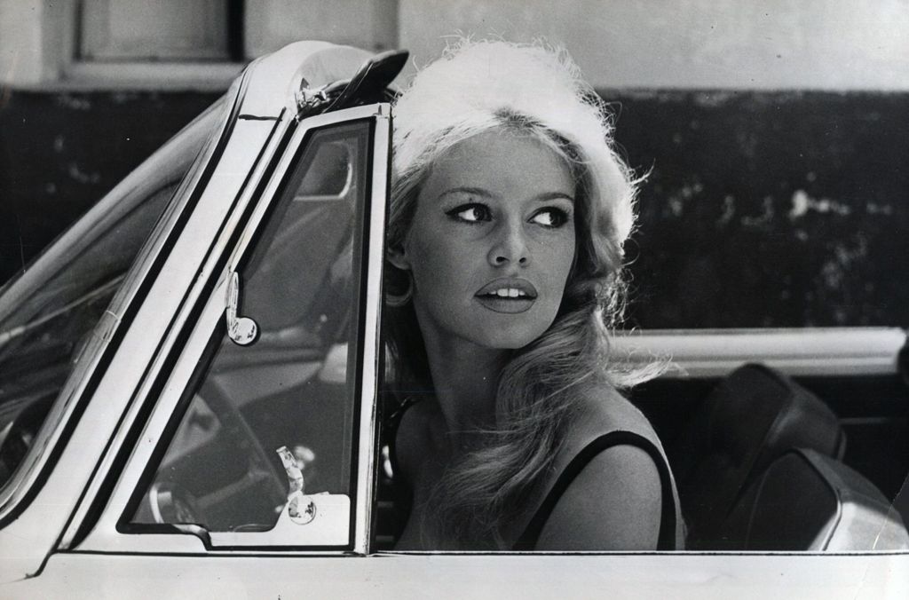 Bardot in a new car that she just received while filming the 1959 movie, Voulez-vous danser avec moi? (Do you want to dance with me?) 