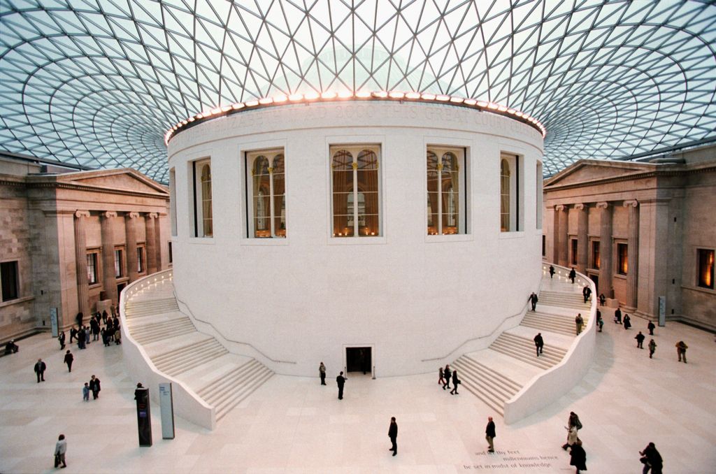 British Museum internal courtyard with spiral staircase on both sides.
Glass meche roof
