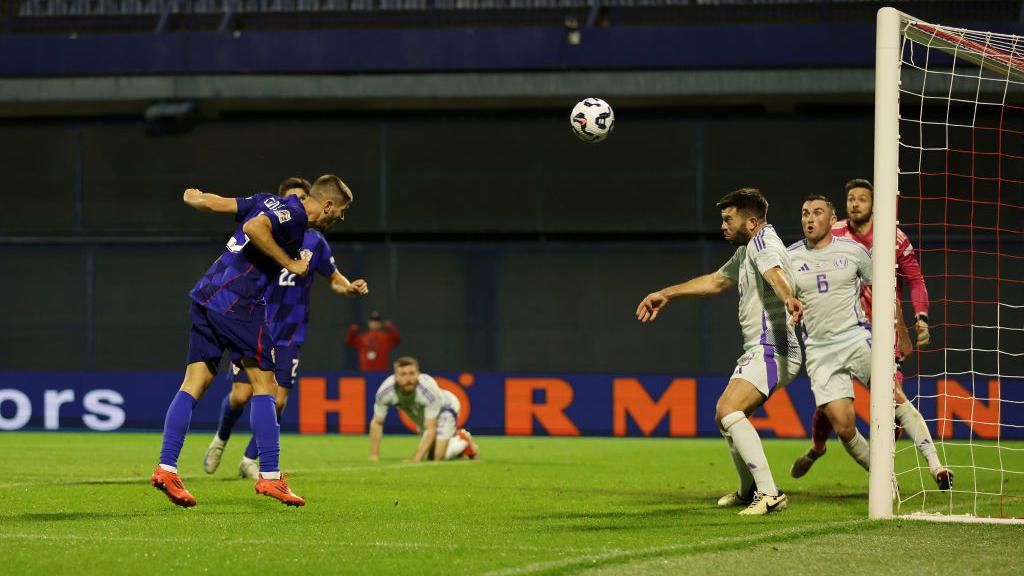 Andrej Kramaric of Croatia scores his team's second goal past Craig Gordon of Scotland during the UEFA Nations League 2024/25 League A Group A1 match between Croatia and Scotland at Stadion Maksimir on October 12, 2024 in Zagreb, Croatia.