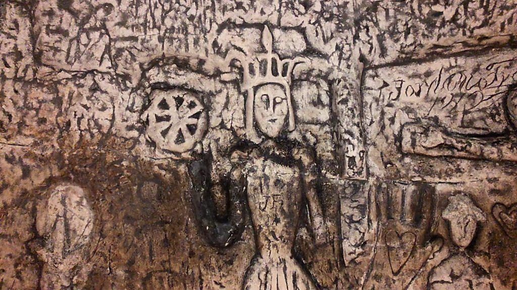 Royston Cave's 'Knights Templar' carvings appear on football kit - BBC News