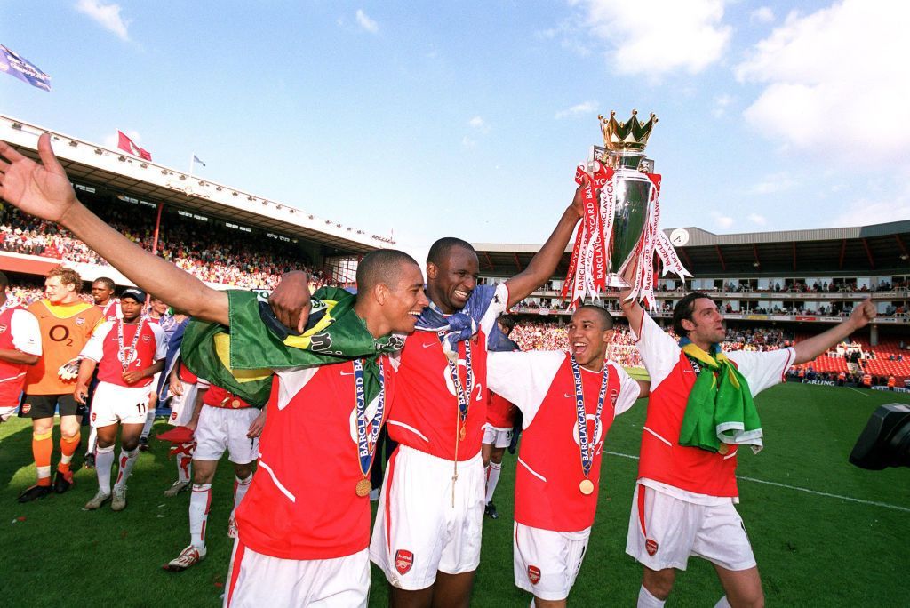 Arsenal captain Patrick Vieira lifts the Premier League trophy aloft