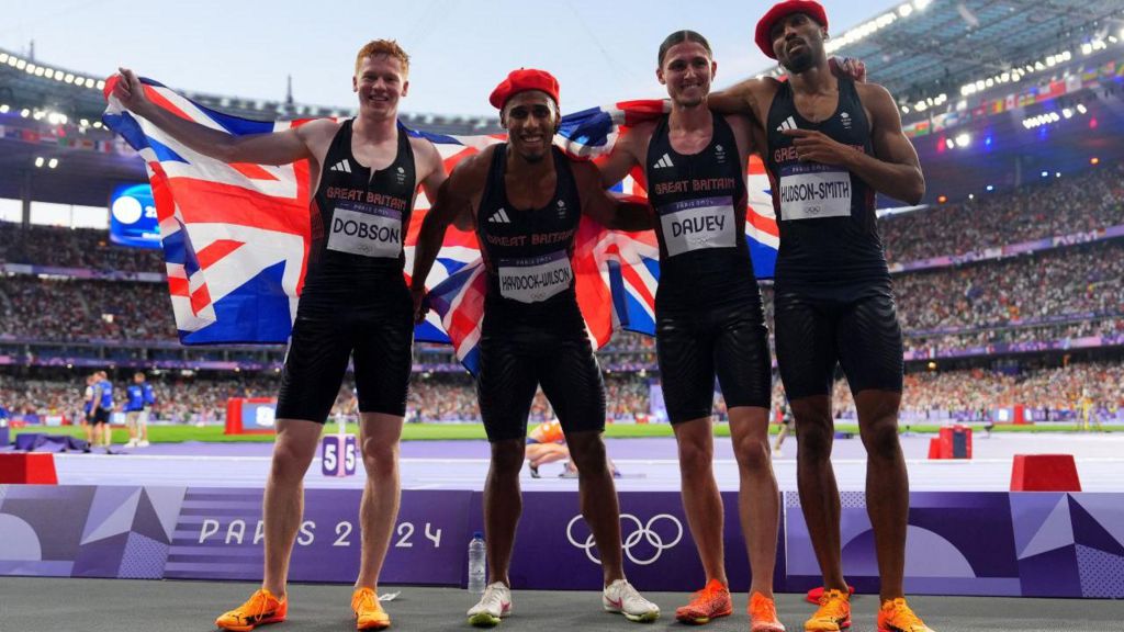 Charles Dobson, Alex Haydock-Wilson, Matthew Hudson-Smith, and Lewis Davey celebrate after winning bronze