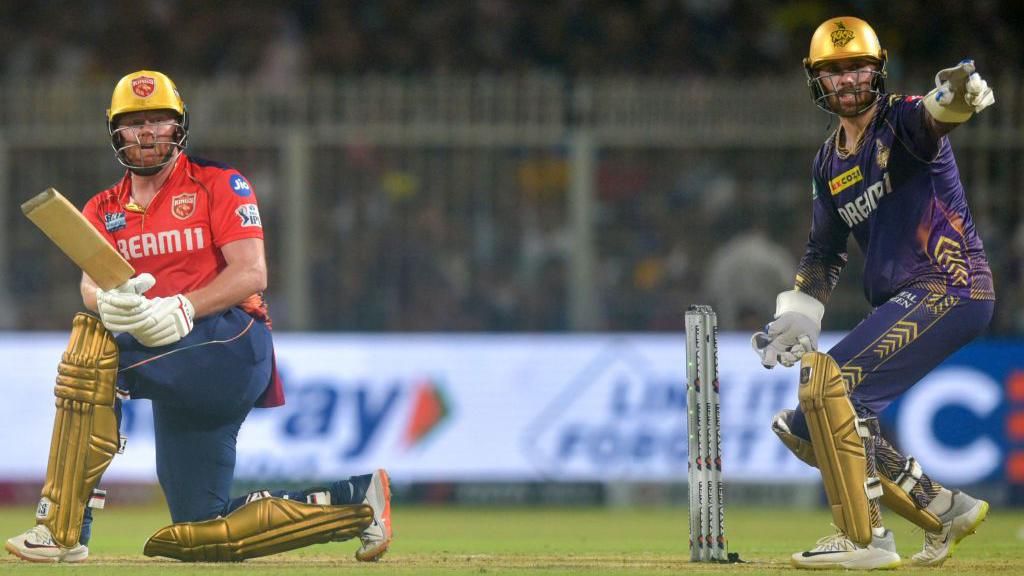 Jonny Bairstow bats as Phil Salt keeps wicket during IPL match