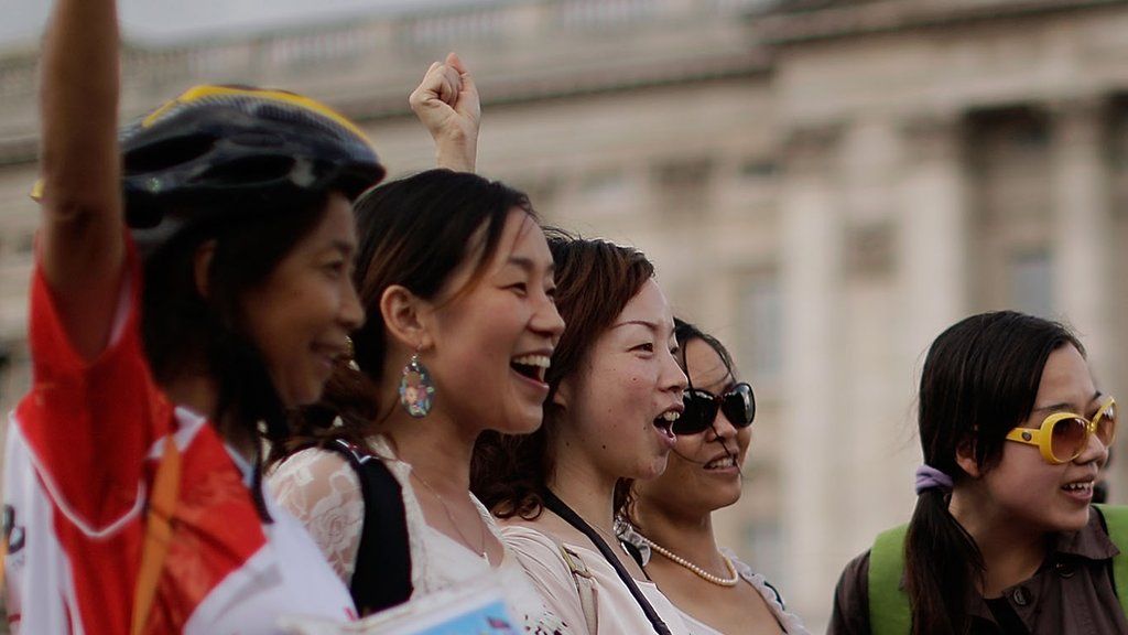 Chinese tourists outside Buckingham Palace during the London 2012 Olympics