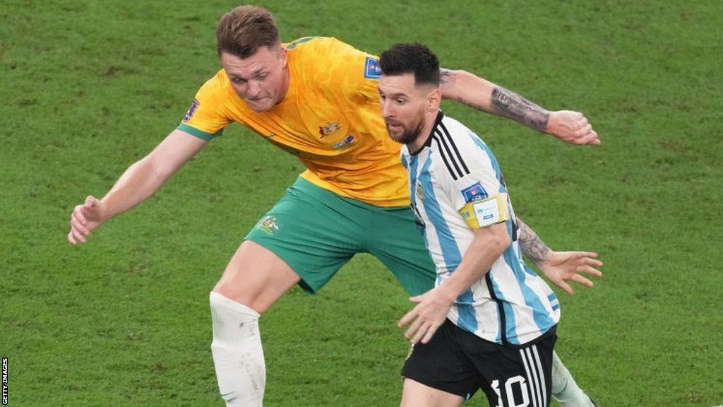 Australia's Harry Souttar and Argentina's Lionel Messi