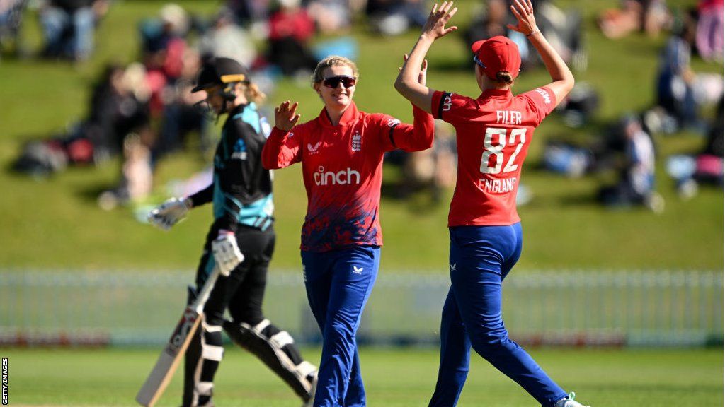 Charlie Dean and Lauren Filer celebrate a wicket v New Zealand
