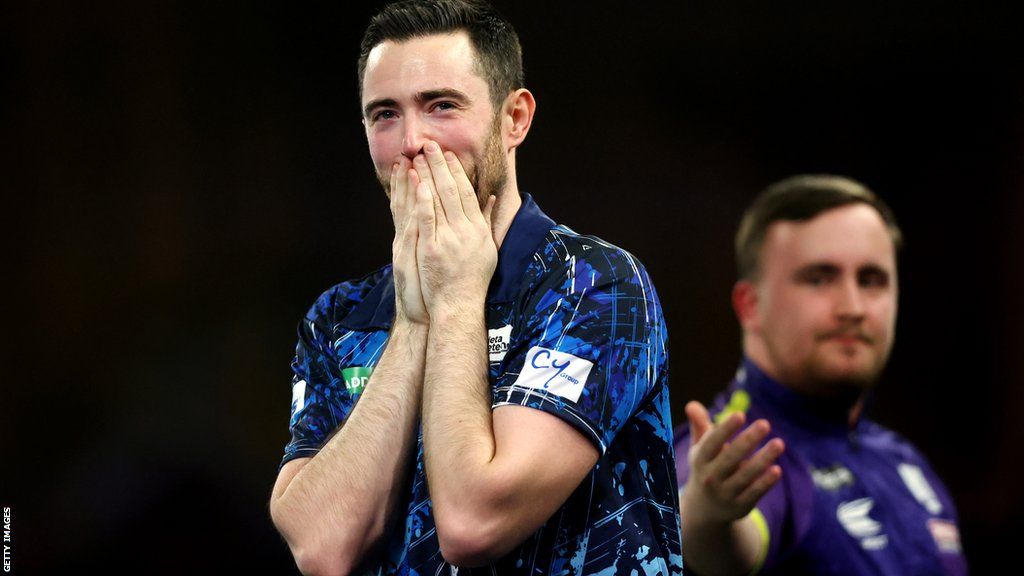 Luke Humphries celebrates winning the PDC World Darts Championship