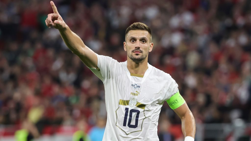 Serbia's Dusan Tadic reacts during a Euro 2024 qualifier against Hungary