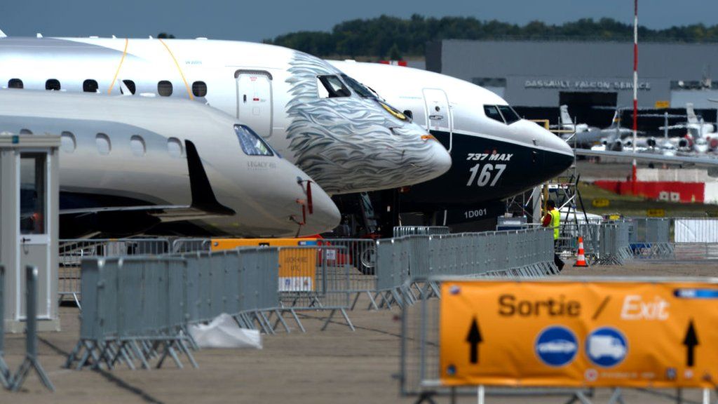 Jetliners stand on the tarmac on June 16, 2017 in le Bourget near Paris prior to the opening of the International Paris Air Show on June 19