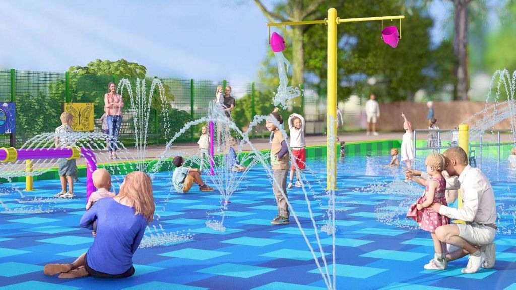 A closer computer-generated image of the splash park, featuring a number of brightly-coloured water features. 