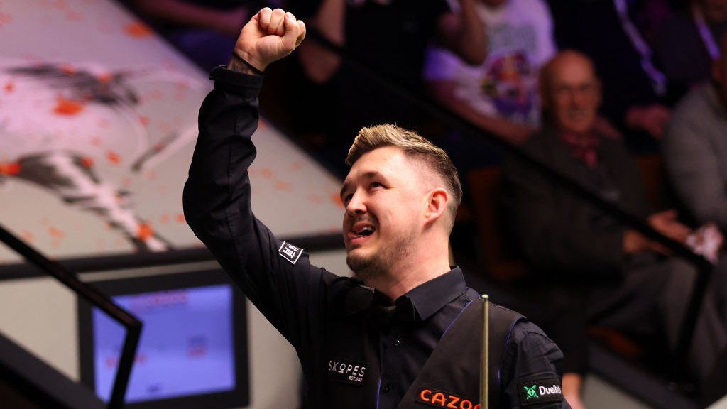Kyren Wilson clenches his fist in celebration after his 147