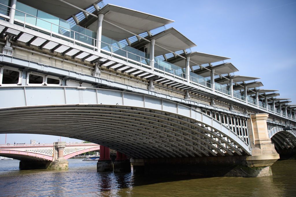 The panelled roof of Blackfriars Bridge, currently the world's largest solar-powered bridge, is seen from the south bank of the River Thames on July 4, 2017 in London, England. 