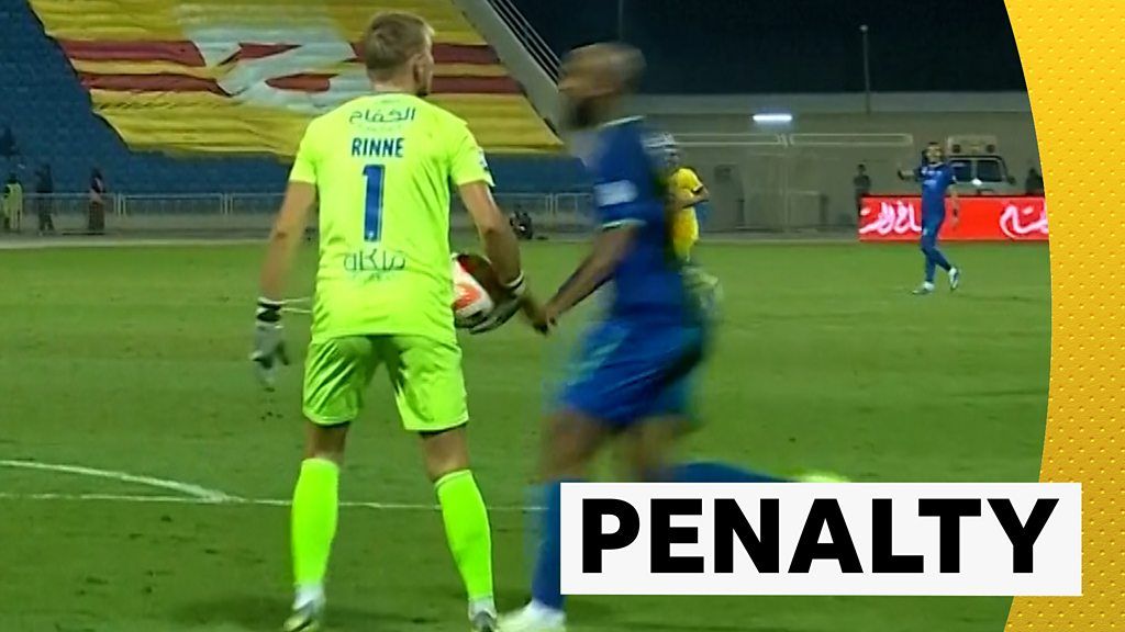 Penalty! - Defender handles ball while high-fiving keeper