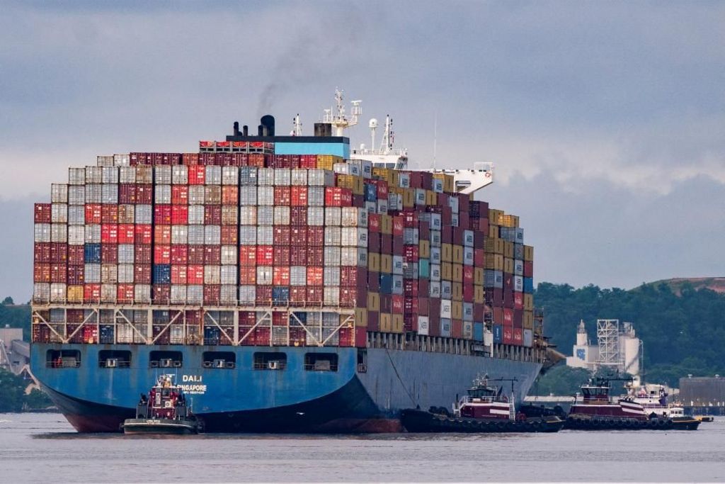 The large cargo ship the Dali moves from the Francis Scott Key Bridge