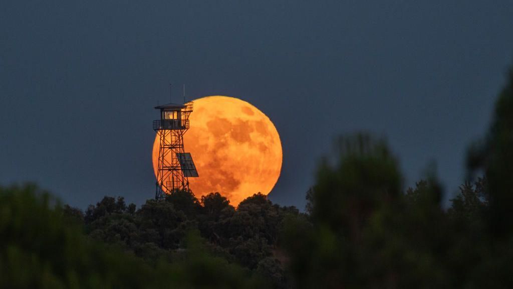 Strawberry Moon: Full Moon rises at famous sites over the world - BBC ...