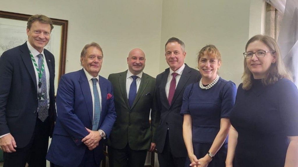 A group of people wearing formal attire stand together for a photo. From left to right they are: Richard Tice, Sir John Hayes, Marc Jones, Paul Gibson, Victoria Atkins and Dr Caroline Johnson.