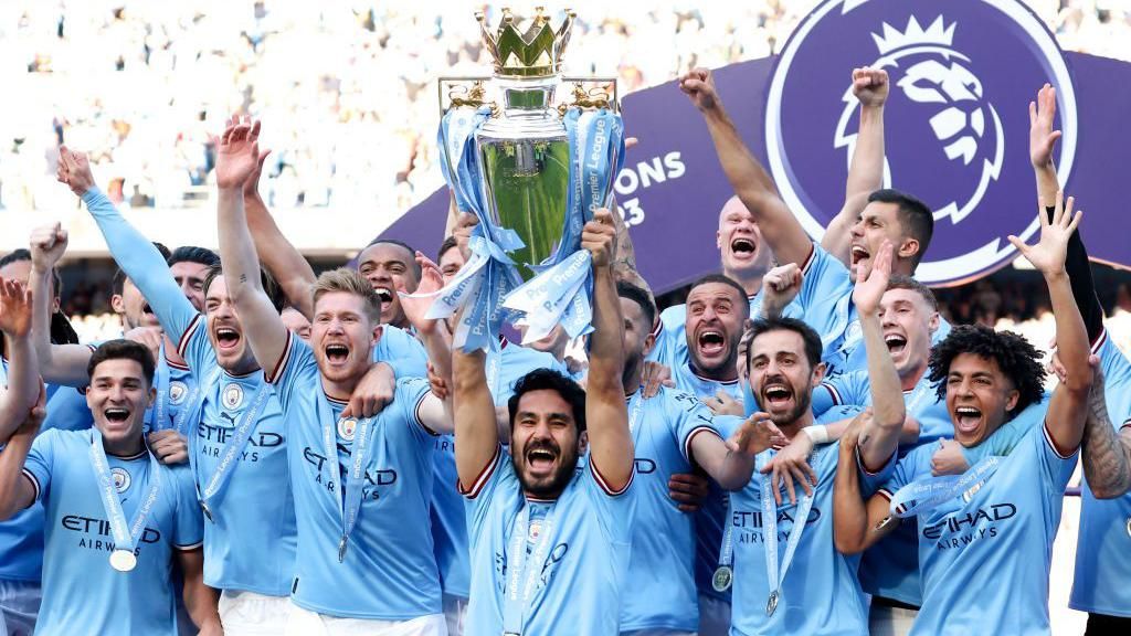Manchester City lifting the Premier League trophy in 2023