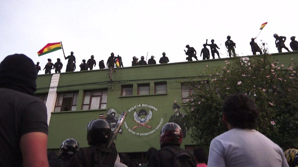 Officers protest on roof of police station