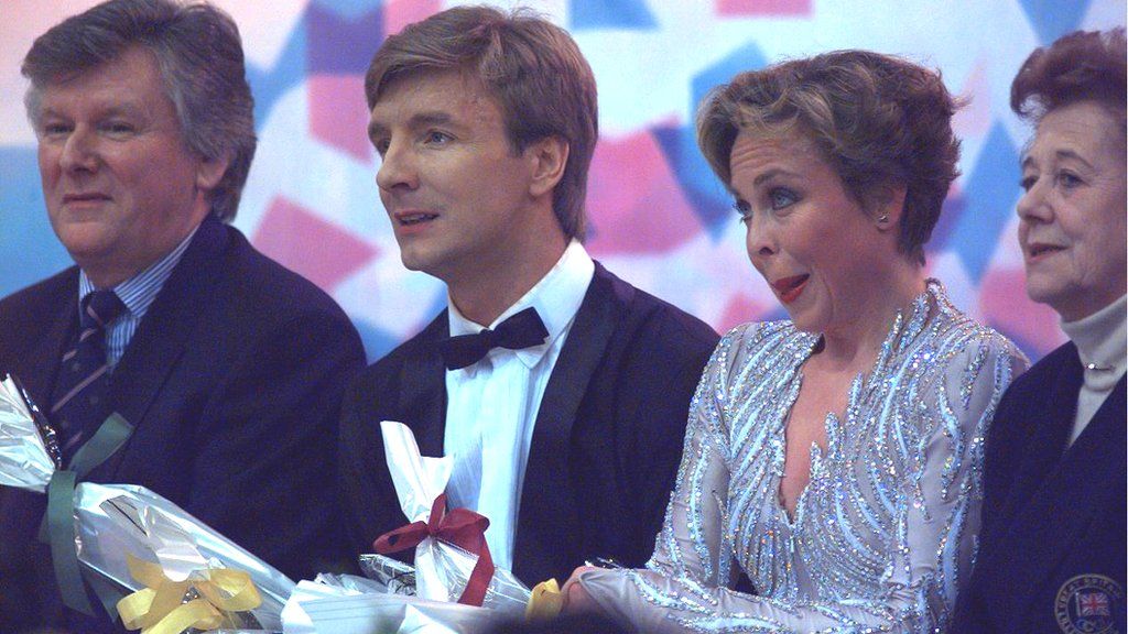 Torvill and Dean, still dressed in their ballroom costume react with dismay as their scores come in for the Lillehammer 1994 free dance