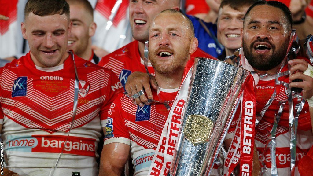 James Roby celebrates with team-mates after St Helens' fourth Super League title in a row last year
