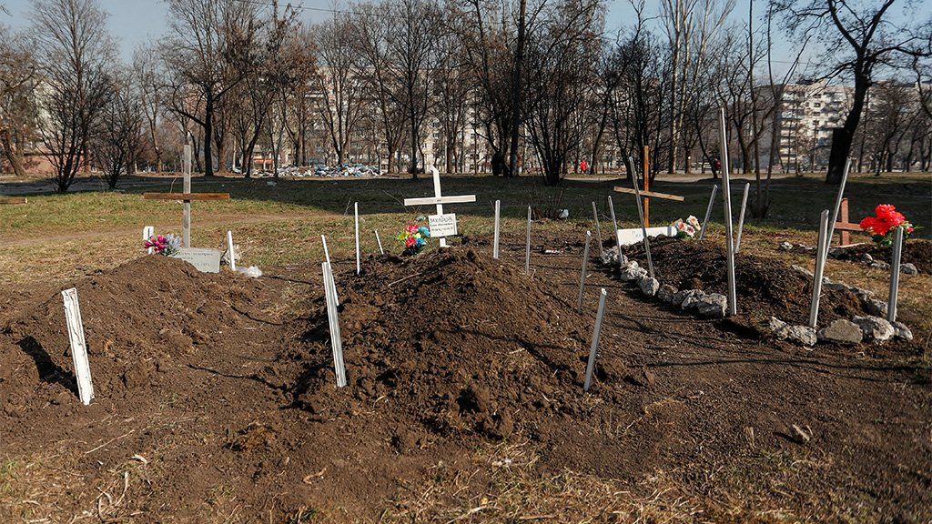 Graves of people killed by shelling in Mariupol