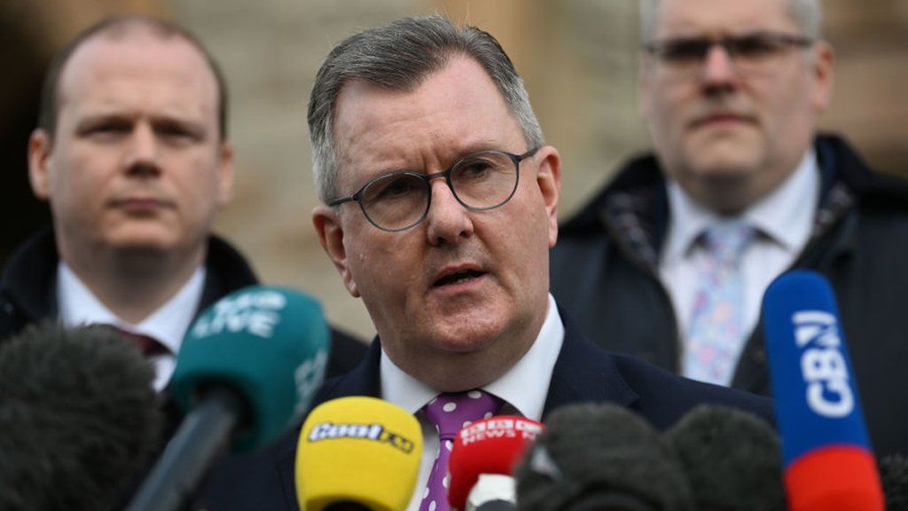 DUP leader Sir Jeffrey Donaldson talks to the media after holding talks with UK Prime Minister Rishi Sunak at Culloden hotel on February 17, 2023 in Belfast, Northern Ireland