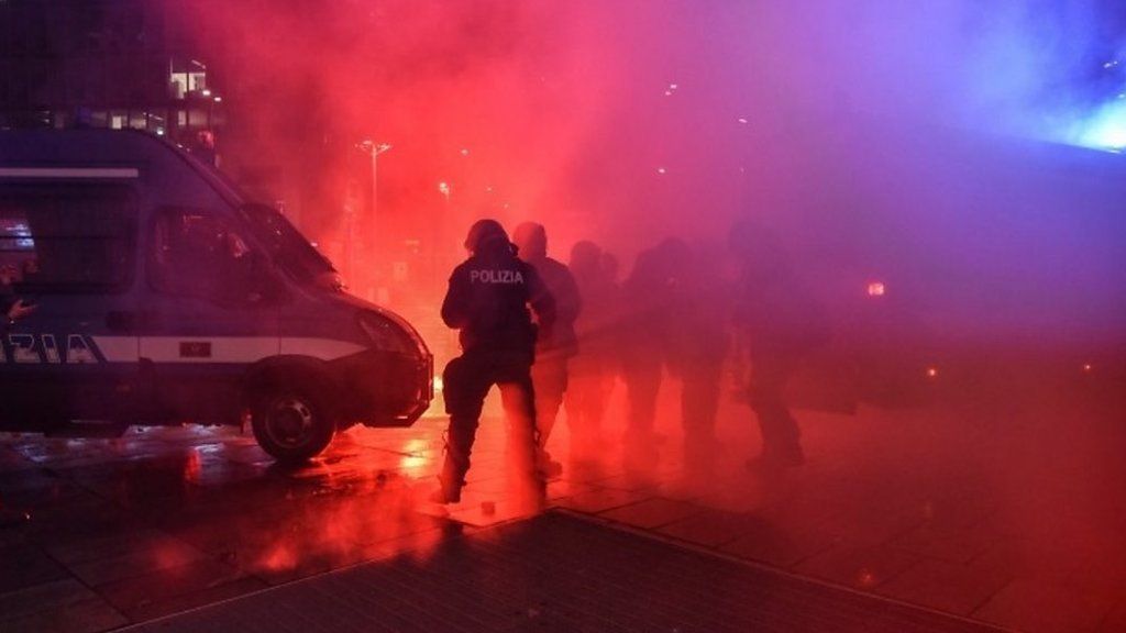 Police clash with protesters in Milan
