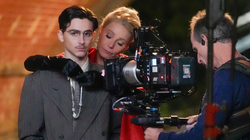 Gwyneth Paltrow and Timothee Chalamet on the set of "Marty Supreme" on October 16, 2024 in New York City.