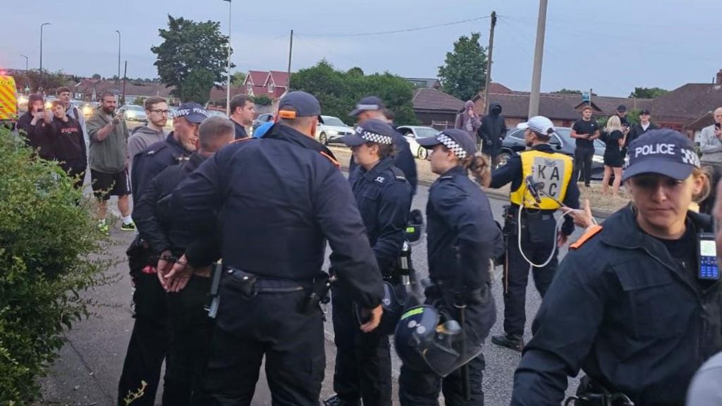 A man being arrested by police