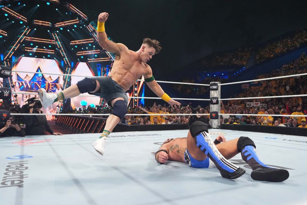 John Cena lands a Five Knuckle Shuffle on AJ Styles during Crown Jewel at RAC Arena on October 11, 2025 in Perth, Australia.