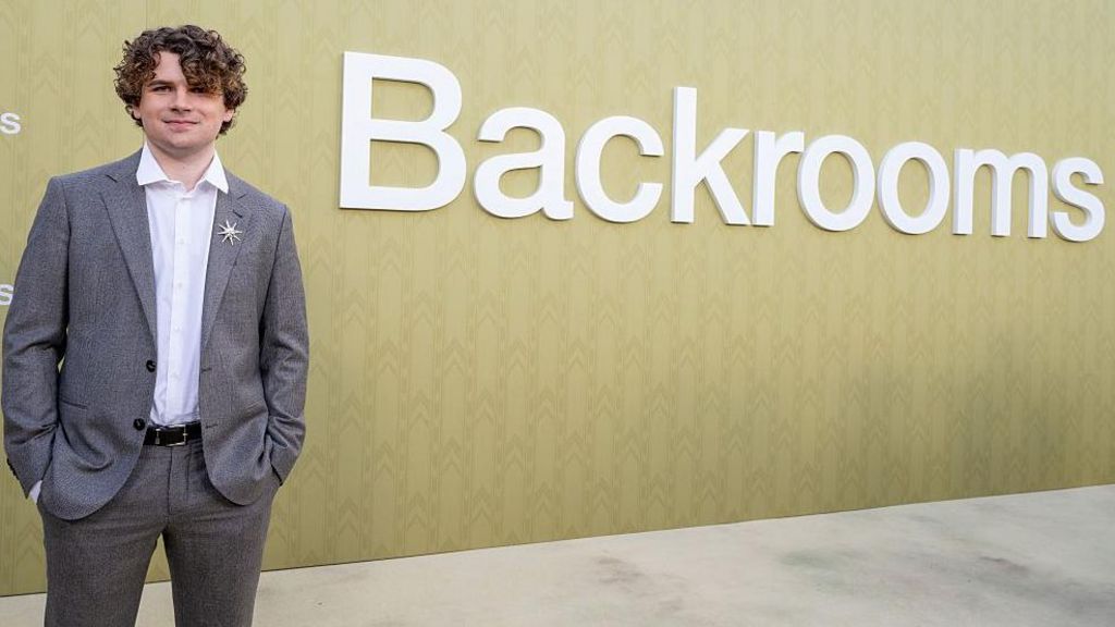 Kane Parsons in a suit at an LA screening of his film adaptation of Backrooms