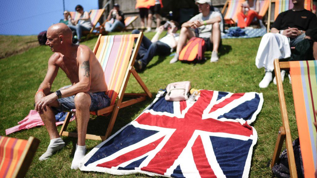 Motor racing fans soak up the atmosphere ahead of the F1 Grand Prix of Great Britain at Silverstone Circuit in Northampton