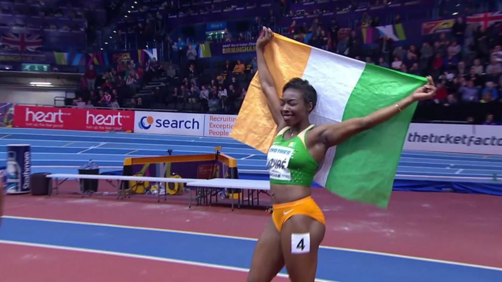 afhængige filosofi karton World Indoor Championships: Ivory Coast's Ahoure celebrates 60m gold with Irish  flag - BBC Sport