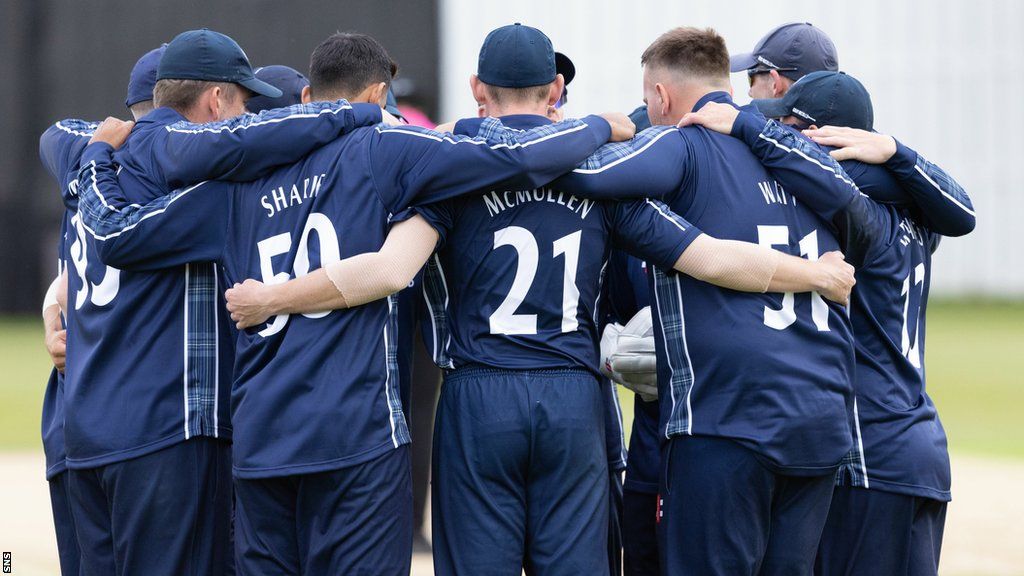 Scotland cricket players form a huddle