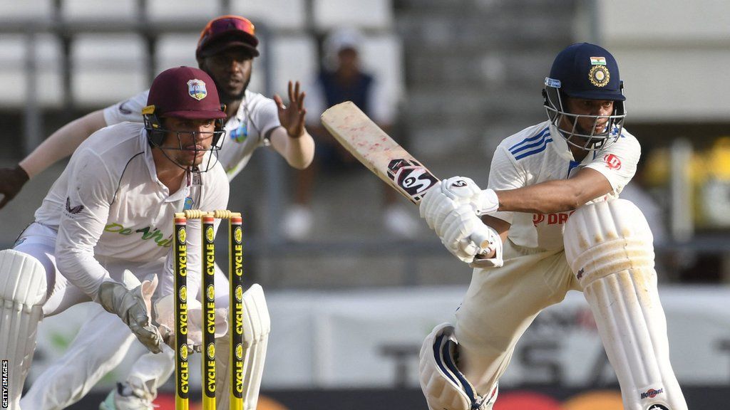 India's Yashasvi Jaiswal sweeps, watched by West Indies wicketkeeper Joshua Da Silva