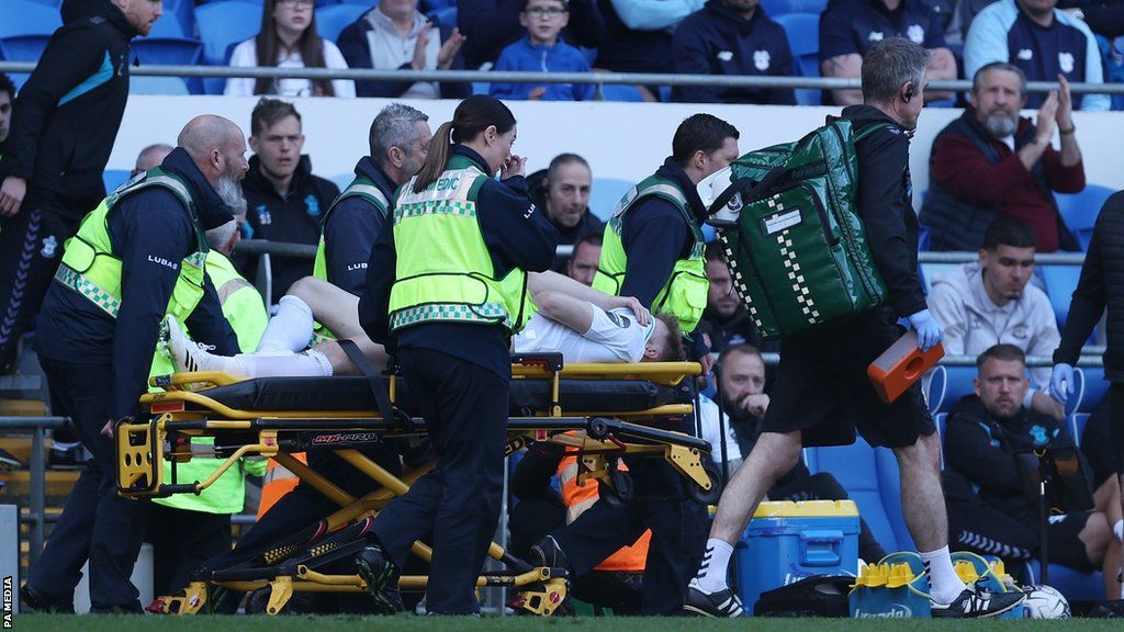 Southampton's Stuart Armstrong leaves the field on a stretcher