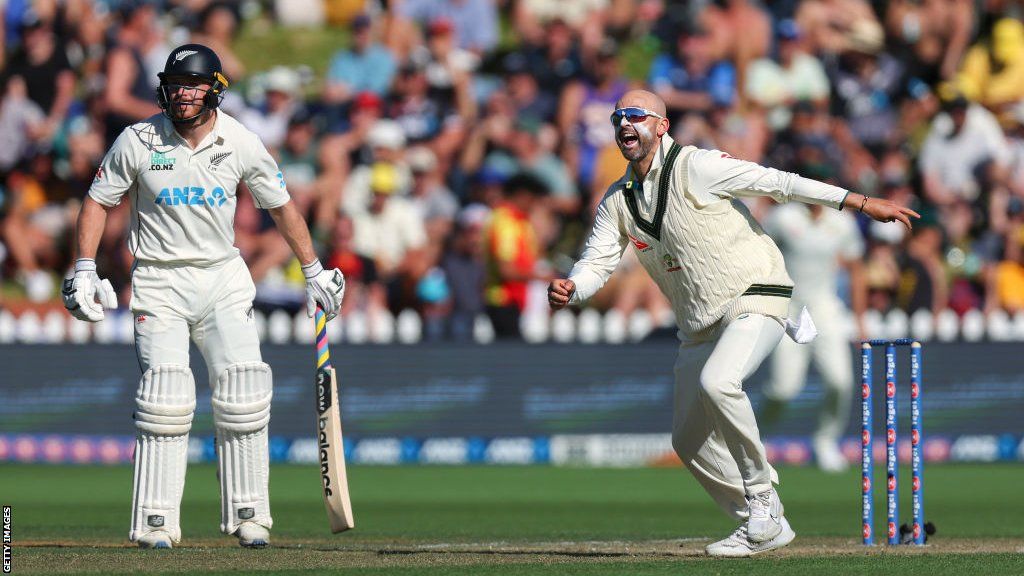 Australia spinner Nathan Lyon begins to celebrate after taking a wicket