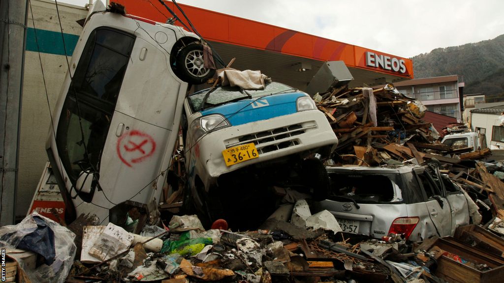 Cars which were destroyed by the earthquake and tsunami that hit Japan in 2011