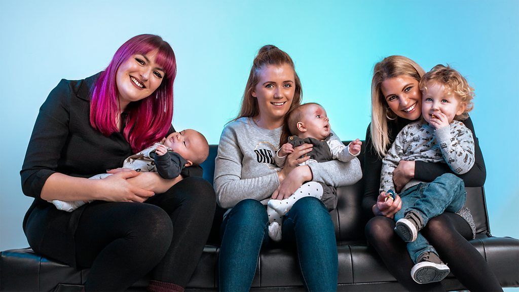 Three women holding babies