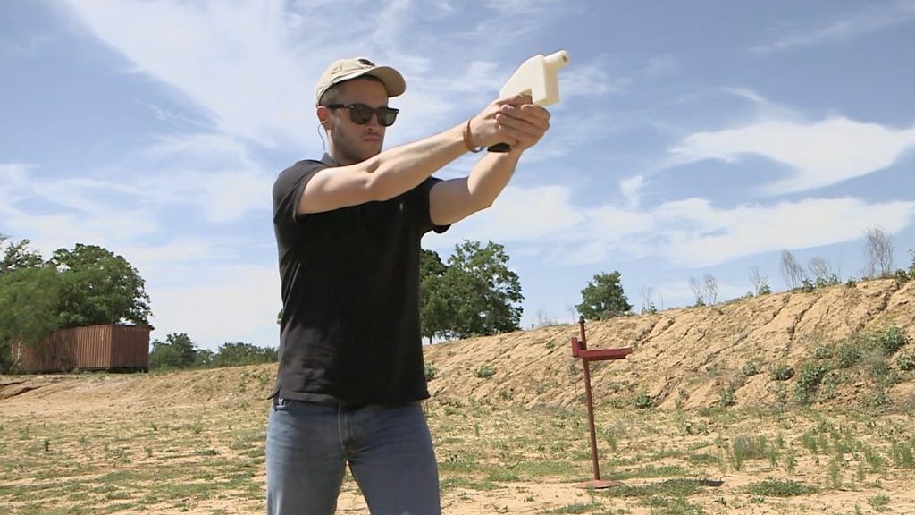 Cody Wilson firing the first 3D-printed gun five years ago
